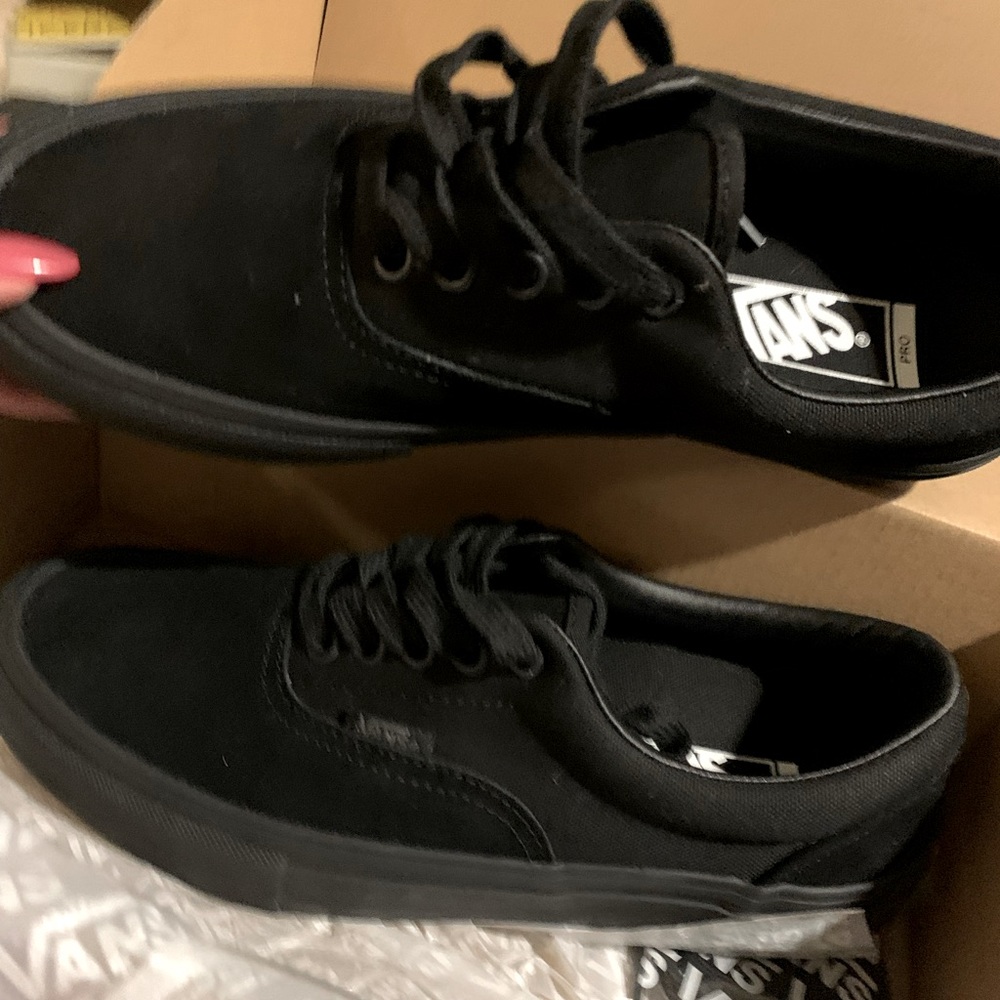 Vans era pro, all black. Still new in box only tried in didn’t fit to well.
